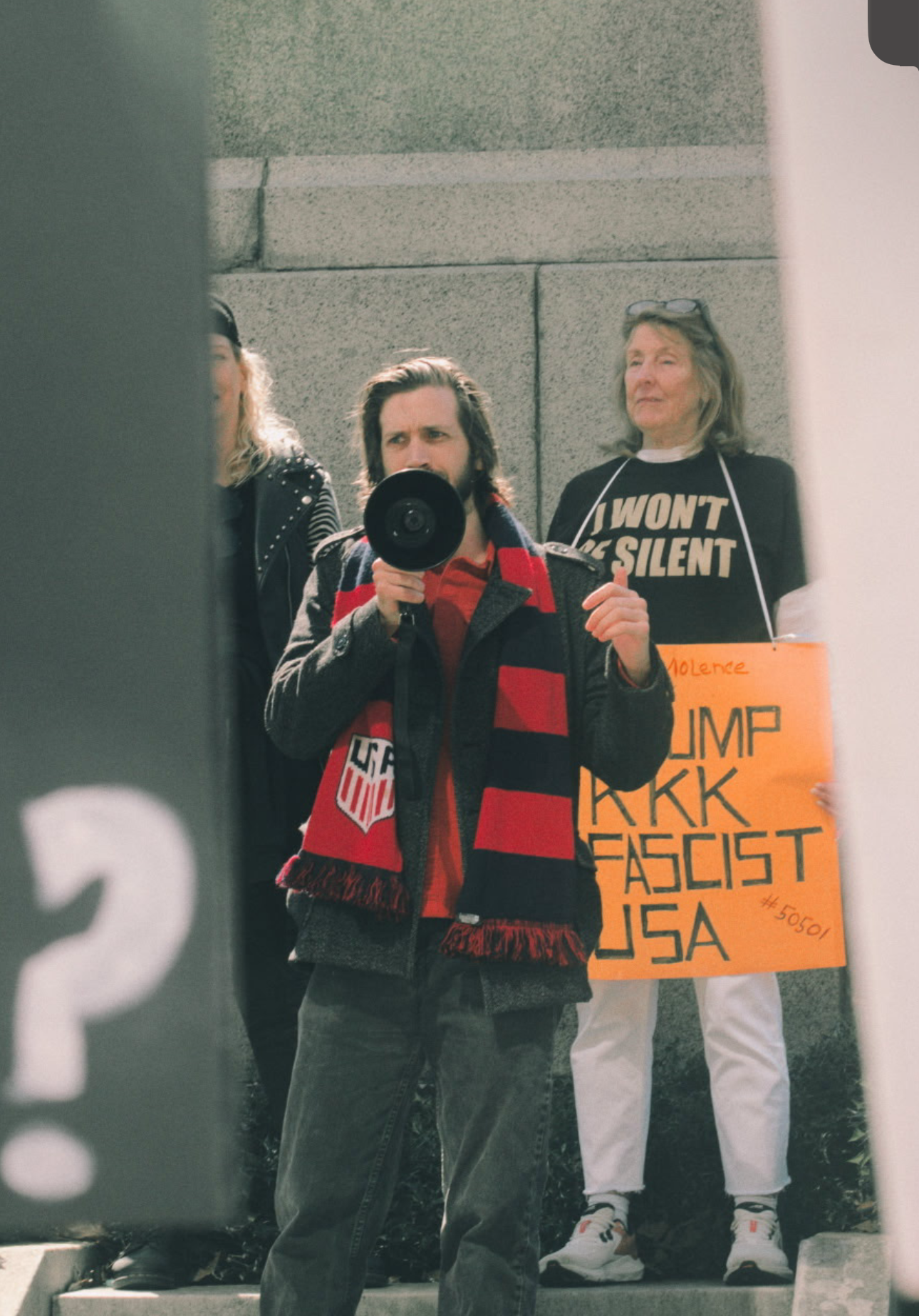 Gideon Vicini speaking at a 50501 protest
